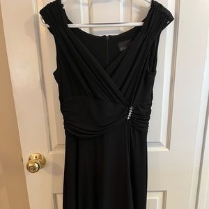 Black cocktail dress. Very figure flattering!